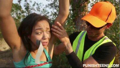 Ebony teen Adrian is dominated by white hunter in woods - bdsm.one