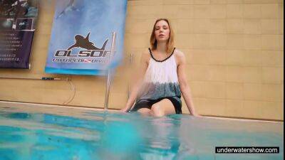 Teen girl Avenna is swimming in the pool - ah-me.com