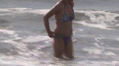 58-YEAR-OLD HAIRY MOTHER IS SHOWN IN BIKINI ON THE BEACH - sunporno.com