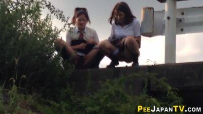 Japanese teens in uniform pissing - pornoxo.com - Japan