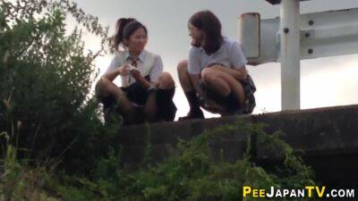 Japanese teens in uniform pissing - pornoxo.com - Japan