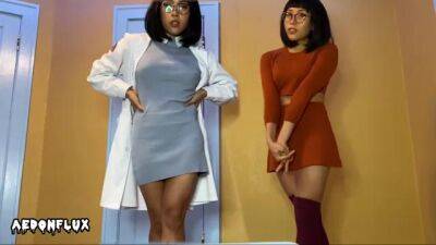 Nerdy Asian girls, Velma and Dr. Fujita are posing and teasing in front of the camera - sunporno.com