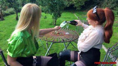 Busty Blonde - Redhead British mature Red and her hot busty blonde girlfriend are outside enjoying a bottle of wine. Next thing you know, Red has her face deep in her girlfriends cunt! - sunporno.com - Britain